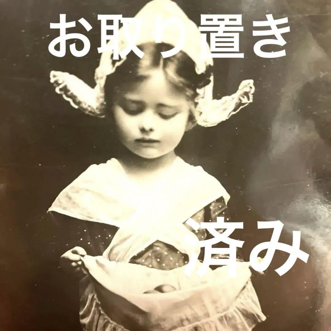 アンティークポストカード　エプロン姿の少女